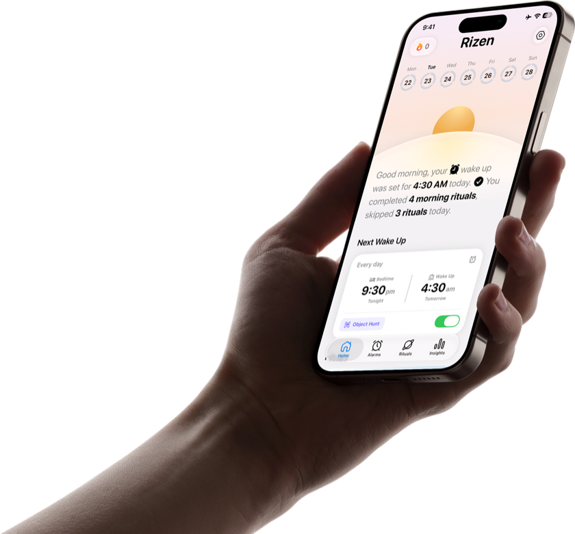 Hand holding an iPhone with the Rizen alarm clock app home screen showing a 4:30 AM wake-up and completed morning rituals